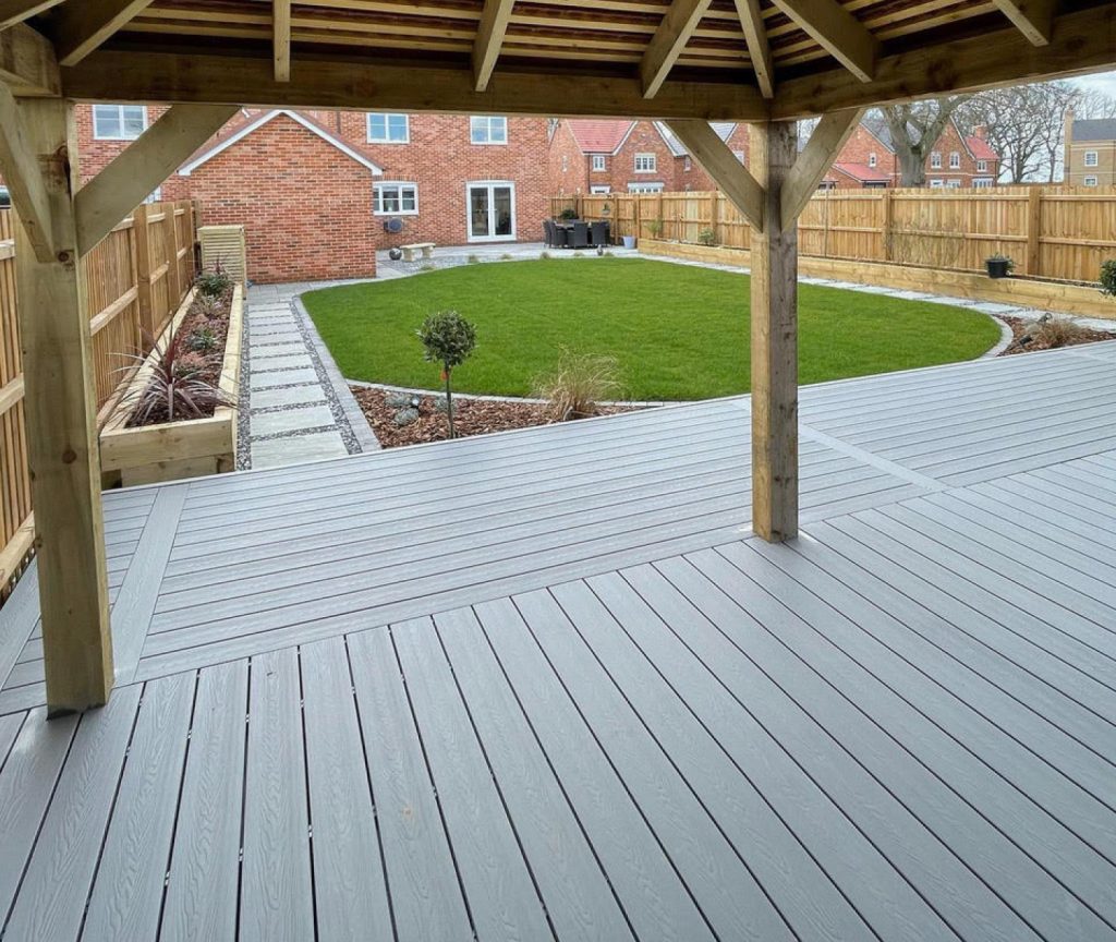 Grey Composite Decking Used In A Garden - Assured Composite